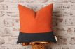orange and navy pillow